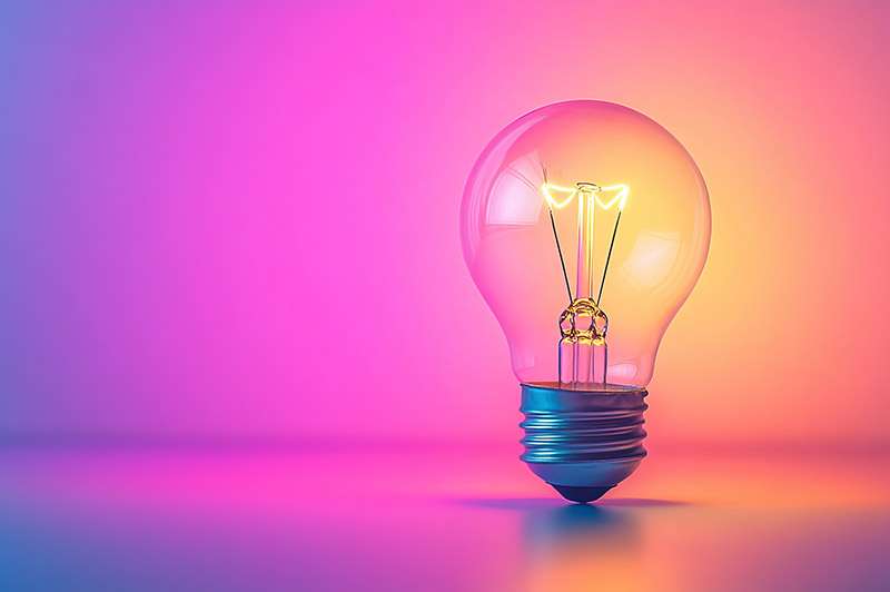 Smart lighting for renters example, showing a singular bulb with a variety of colours illuminating the wall.